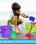 Child playing with 12 Pack Kids Sand Buckets And Shovels Set With 7.48 Inch Buckets And Shovels Bright Beach Toys at the beach