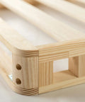 Close-up of the sturdy frame of Full Size 4 Inch Low Profile Wood Box Spring Mattress Foundation with thick slats.