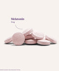 Melatonin 5 Mg Fast Dissolve Sleep Tablets Strawberry Flavor 150 Count tablets stacked, close-up view