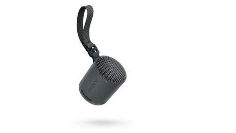Black XB100 Wireless Bluetooth Portable Speaker With Deep Bass IP67 Waterproof Dustproof Super Compact Travel Buddy featuring versatile strap