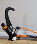 Lightweight Pneumatic 2-In-1 Flooring Nailer And Stapler 15.5-Gauge And 16-Gauge Versatile Tool With Mallet on hardwood floor