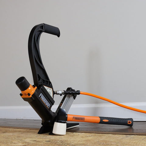 Lightweight Pneumatic 2-In-1 Flooring Nailer And Stapler 15.5-Gauge And 16-Gauge Versatile Tool With Mallet on hardwood floor