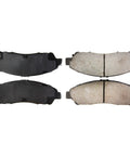Centric POSI-QUIET front brake pads, 4-piece kit for Acura/Honda, black backing plates with gray friction material.