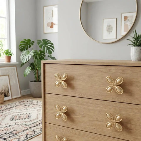 12 Pack Gold Dresser Knob Set With Screws, Solid Zinc Alloy, Brushed Brass Finish, Four Leaf Clover Style on wooden dresser