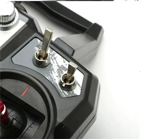 Close-up of FPV Racing Drone Radio Transmitter Built For 2.4G AFHDS 2A 10CH showing switches and control dials.