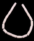 Premium Pink Calcite Faceted Tube Beads 20x10mm Genuine Natural Stone for Jewelry Making, soft pink tube beads arranged.