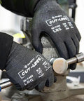 Cut-Less Korplex Glove With Foam Nitrile Palm For Cut Resistance And Dexterity Touch Screen Compatible, large size, in use.