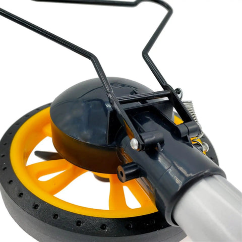 Close-up of Roll Out Digital Measuring Wheel With Telescopic Handle showing gear mechanism and yellow wheel for accurate distance tracking.