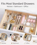 Organized drawer with 13 Piece Clear Drawer Organizer Set For Bathroom And Kitchen, modular plastic bins holding various items neatly.
