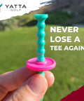 Hand holding a Telos Adjustable Golf Tee in Lucky Green with an easy height disc, promising consistent drives and lower scores.