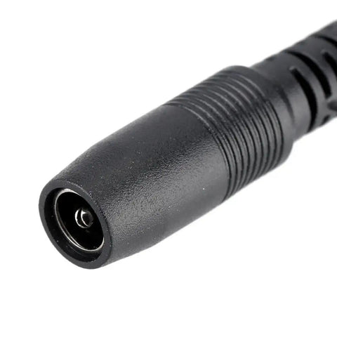 Close-up of black plug from 1 To 3 Way Daisy Chain Cable For Guitar Effects Pedals, 9V DC Power Splitter Cable With 3 Plug Outputs