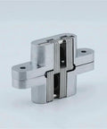 Rock Solid Stainless Steel Concealed Door Hinges That Deliver A Slick 180 Degree Swing Motion And Loads Of Heavy Duty Support For Tight Cabinetry And No Fuss Daily Home Repairs, seen from an angle.