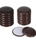Self Adhesive Furniture Sliders For Carpet And Hardwood Floors 2 Inch Diameter Peel And Stick Floor Savers 16 Pack glides stacked.