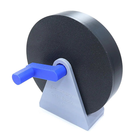 Hands On Assemblable Planetary Gear Model Kit For Demonstrating Gear Ratios shown with a black gear and blue handle.