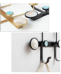 Heavy Hitter Wall Mounted Coat Hooks With Sleek Gold Iron Finish For Holding Coats Hats Keys And Jackets showing close-up detail.