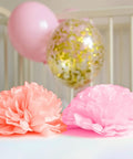 Peach and pink pom poms with balloons, part of Colorful Tissue Paper Pack 150 Sheets for Gift Wrapping and Crafting.