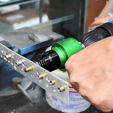 Transform Your Drill Into A Riveter With This Killer Adapter Kit Including Mandrels And Nuts For Effortless Fastening On Any Heavy Duty Project Right Now. drill riveter adapter on metal sheet