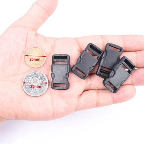 Half Inch Side Release Buckles 10 Pack Black Plastic Quick Release Buckles for backpack straps and DIY pet collars displayed on a hand