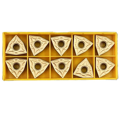Ten CNMG 120404 carbide inserts for Five Eighth Inch Lathe Tool Holder MCLNR1616H12 in a yellow container for CNC machining.