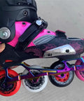 Inline skate with pink and black boot featuring four multicolored wheels, showcasing 'Skate Wheel Replacements For Inline Skates 68Mm 72Mm 76Mm Or 80Mm 92A Hardness For Asphalt Outdoor And Indoor Use With Sick Grip And Solid Shock Absorption Delivers A Smooth Ride On Street Or Rink' setup.