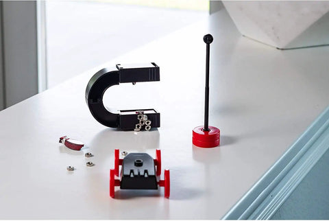 Magnet Science Kit for Kids With 10 Hands On Magnetic Experiments And Games And 25 Plus Pieces on a white surface