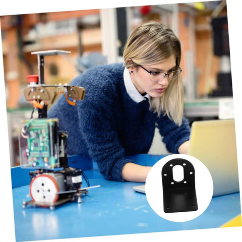 Person using laptop with DIY robot and 37 motor mounting bracket