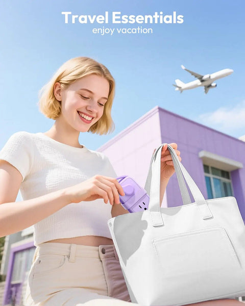 Person placing Purple Travel Power Strip With Four Outlets And Three USB Ports Including USB C into a white bag outdoors.