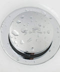 Tip Toe Bathtub Drain Trim Kit With Two Hole Overflow Faceplate Chrome Plated Finish Replacement Bath Drain Stopper Easy Tap To Open No Fuss Design Universal Fine And Coarse Thread with water droplets on surface
