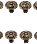 Metal Flower Shape Pull Handle Cabinet Knob Bronze Tone Set Of 8 With Screws For Doors And Drawers displayed in a row.