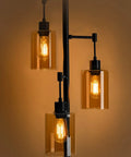 Industrial Floor Lamp With Amber Glass Shades Three Head Tree Design Tall Black Pole Lamp illuminated with LED bulbs