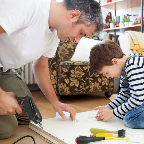 Man and child assembling furniture with Flexible Drill Bit Extension Set All In One 19 Pieces