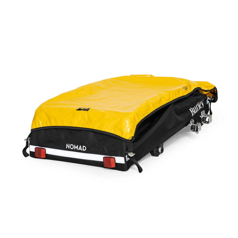 Nomad Touring Cargo Bike Trailer with water resistant cover, lightweight aluminum frame, two wheel chassis, large storage capacity.
