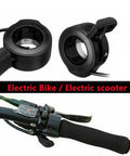 Black thumb throttle for electric bike and scooter with responsive hall sensor, easy install, non-slip grip, fits most models.