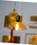 Pendant light with amber glass shade using Heavy Duty Full Thread Hollow Screw Rods For Light Fixtures Durable Tube Adapter For DIY Lamp Kits Easy Installation And Versatile Lamp Repair Parts And Components