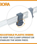 Adjustable plastic risers on Heavy Duty 50 Inch Parallel Clamps 2 Pack Woodworking Bar Clamps for stabilizing work pieces.