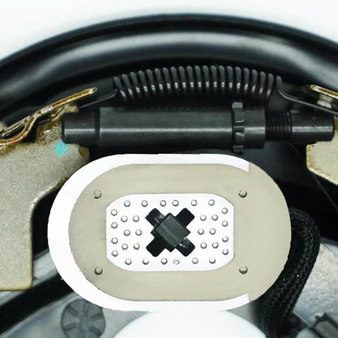 Close-up of 12x2 Inch Electric Trailer Brake Magnet Kit for 5200 to 7000 lbs Dexter Type Replacement showing retainer clips and springs