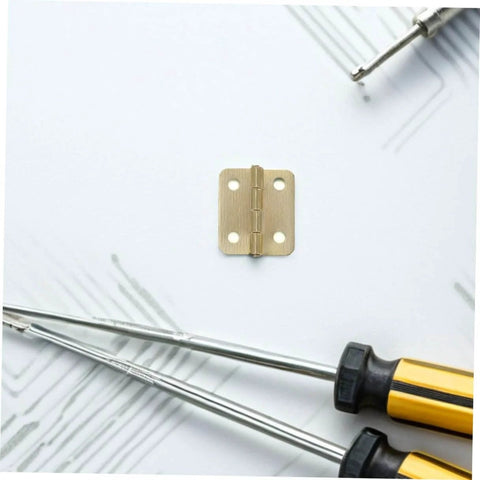Close-up of a gold hinge from the 40 Pcs Mini Iron Hinge Set With Screws For Jewelry Boxes And Tiny Chests 270 Degree Rotation.