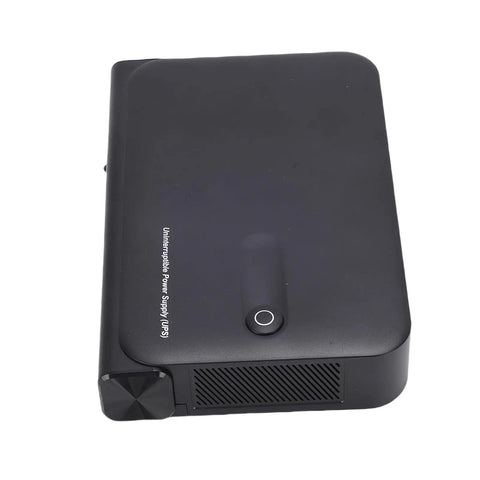 Mini UPS Backup Power Supply For Routers Modems And Security Cameras With 36W US Plug Portable Battery seen from top view.