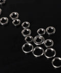 Small Industrial Manipulator Pneumatic Vacuum Pad Accessory Copper Buckle Ring on black background, showing various sizes.