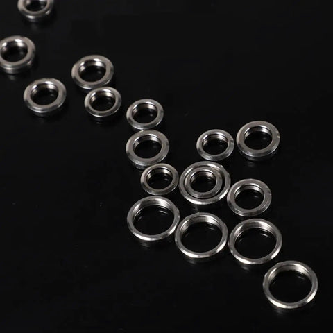 Small Industrial Manipulator Pneumatic Vacuum Pad Accessory Copper Buckle Ring on black background, showing various sizes.