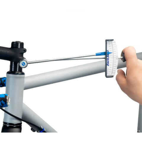Hand adjusting bicycle stem with a Low Torque Bike Torque Wrench 0 To 14 Nm, Three Eighths Inch Drive, showing precision use.