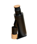 Solid Single Dose Coffee Grinder Featuring 63Mm Red Titanium Conical Burrs And Plasma Ionizer To Crush Beans Sick Flat And Eliminate Static Drama For Flawless Pulls In Sleek Black Housing with wood accents.