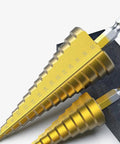 Close-up of titanium coated HSS step drill bit set for wood and metal, showing sharp edges and multiple size markings.