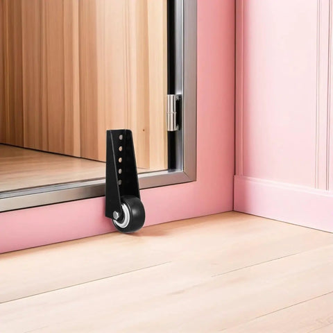 Bulletproof Anti Sag Gate Wheel For Wooden Barn Doors And Outdoor Fences Delivers Hella Smooth Silent Operation With Industrial Cold Rolled Steel Construction mounted on a pink wall.