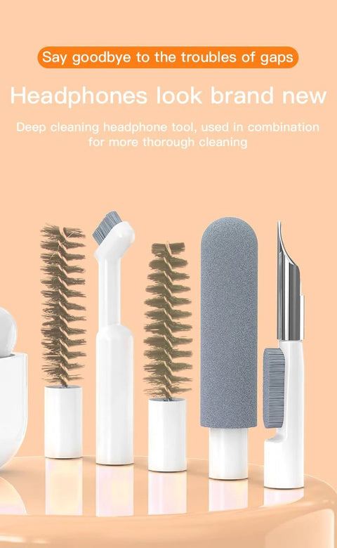 Camera cleaning kit with white handles, blue foam sponge, and multi-functional brush heads for electronics cleaning