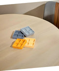 Four Grid Dollhouse Storage Box Resin Organizer For Candy, Nuts, And Sweet Tiny Treats on a table, assorted colors
