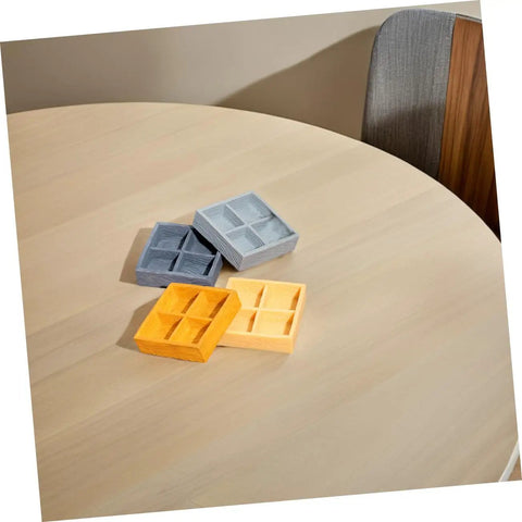 Four Grid Dollhouse Storage Box Resin Organizer For Candy, Nuts, And Sweet Tiny Treats on a table, assorted colors