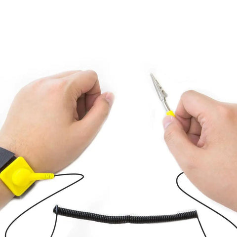 Person using Adjustable ESD Wrist Strap With Grounding Cord For PC Building And Electronics Repair Anti Static Wrist Band