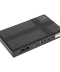 Rock Solid 20000 Mah Ups Battery Backup Offering 18 Watt Output And Us Plug To Keep Your Routers Running No Sweat During Unexpected Power Outages At Home Or Office, showing black power backup unit with input ports.