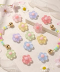 Pastel Jelly Daisy Flower Shoe Charms Set With Glossy Bling Floral Buckles, 12 resin flower clips in pastel colors for sneakers.